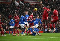 TOPSHOT - Liverpool's English defender #02 Joe Gomez (R) headers at goal but the shot is saved during the English Premier League football match between Liverpool and Sunderland at Anfield in Liverpool, north west England on December 3, 2025. (Photo by Paul ELLIS / AFP via Getty Images) / RESTRICTED TO EDITORIAL USE. No use with unauthorized audio, video, data, fixture lists, club/league logos or 'live' services. Online in-match use limited to 120 images. An additional 40 images may be used in extra time. No video emulation. Social media in-match use limited to 120 images. An additional 40 images may be used in extra time. No use in betting publications, games or single club/league/player publications. /