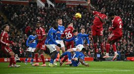 TOPSHOT - Liverpool's English defender #02 Joe Gomez (R) headers at goal but the shot is saved during the English Premier League football match between Liverpool and Sunderland at Anfield in Liverpool, north west England on December 3, 2025. (Photo by Paul ELLIS / AFP via Getty Images) / RESTRICTED TO EDITORIAL USE. No use with unauthorized audio, video, data, fixture lists, club/league logos or 'live' services. Online in-match use limited to 120 images. An additional 40 images may be used in extra time. No video emulation. Social media in-match use limited to 120 images. An additional 40 images may be used in extra time. No use in betting publications, games or single club/league/player publications. /