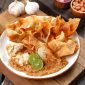 Batagor, makanan khas Jawa Barat asal Bandung, berhasil menduduki peringkat pertama sebagai camilan terbaik di Indonesia versi TasteAtlas.